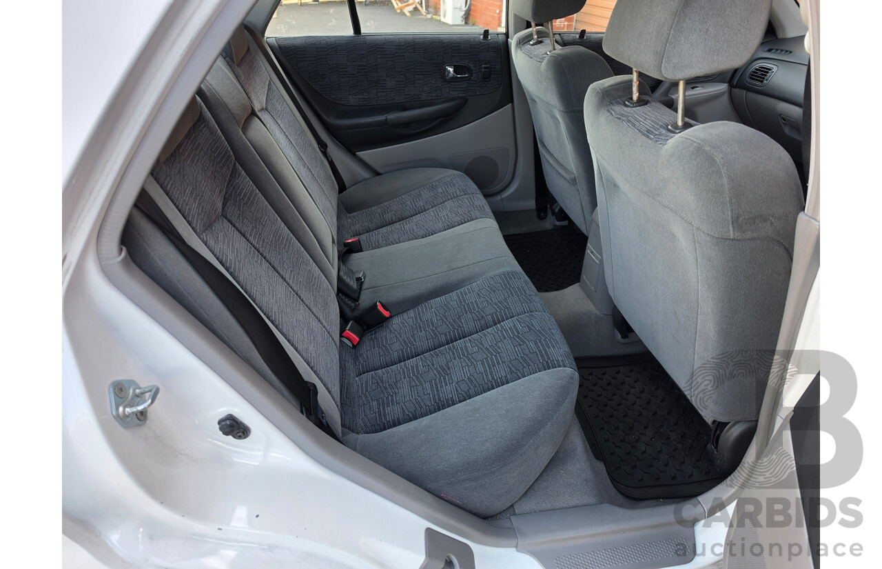 06/2001 Ford Laser GLXi KN 4d Sedan White1.8L