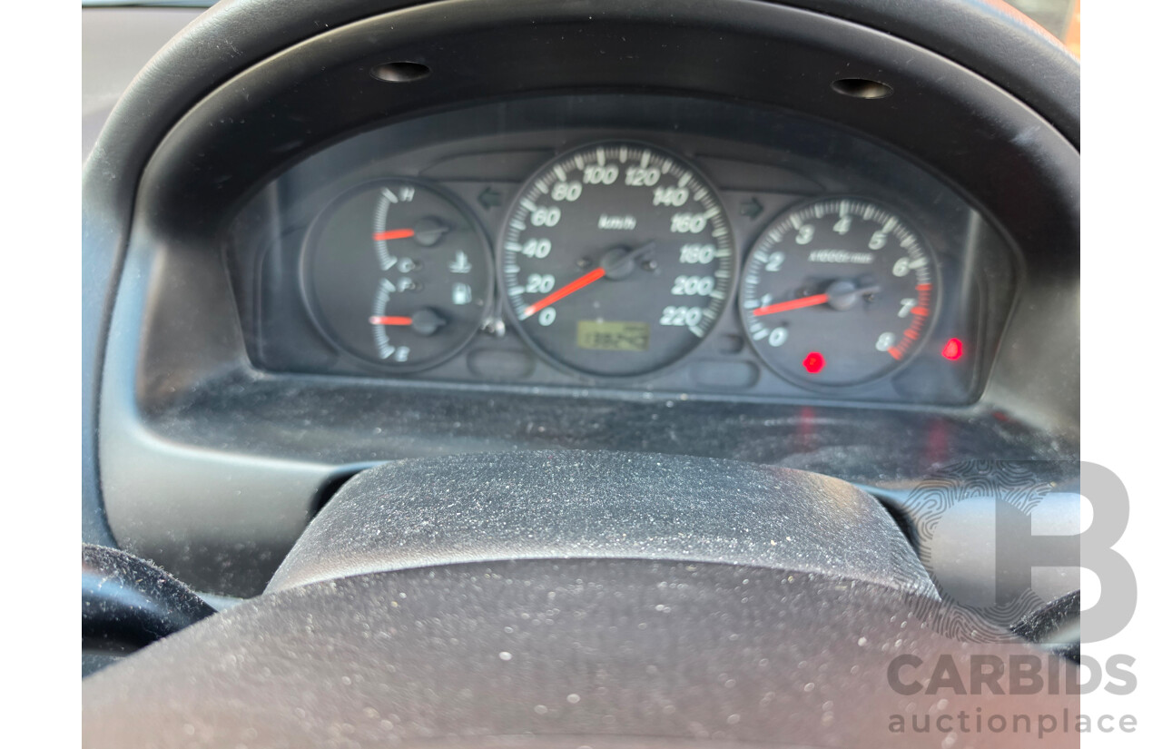 06/2001 Ford Laser GLXi KN 4d Sedan White1.8L