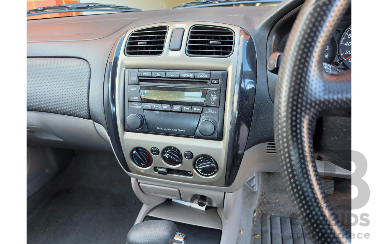 06/2001 Ford Laser GLXi KN 4d Sedan White1.8L