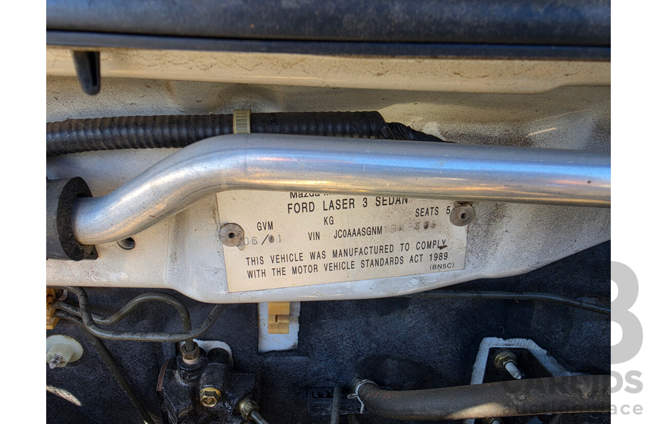 06/2001 Ford Laser GLXi KN 4d Sedan White1.8L