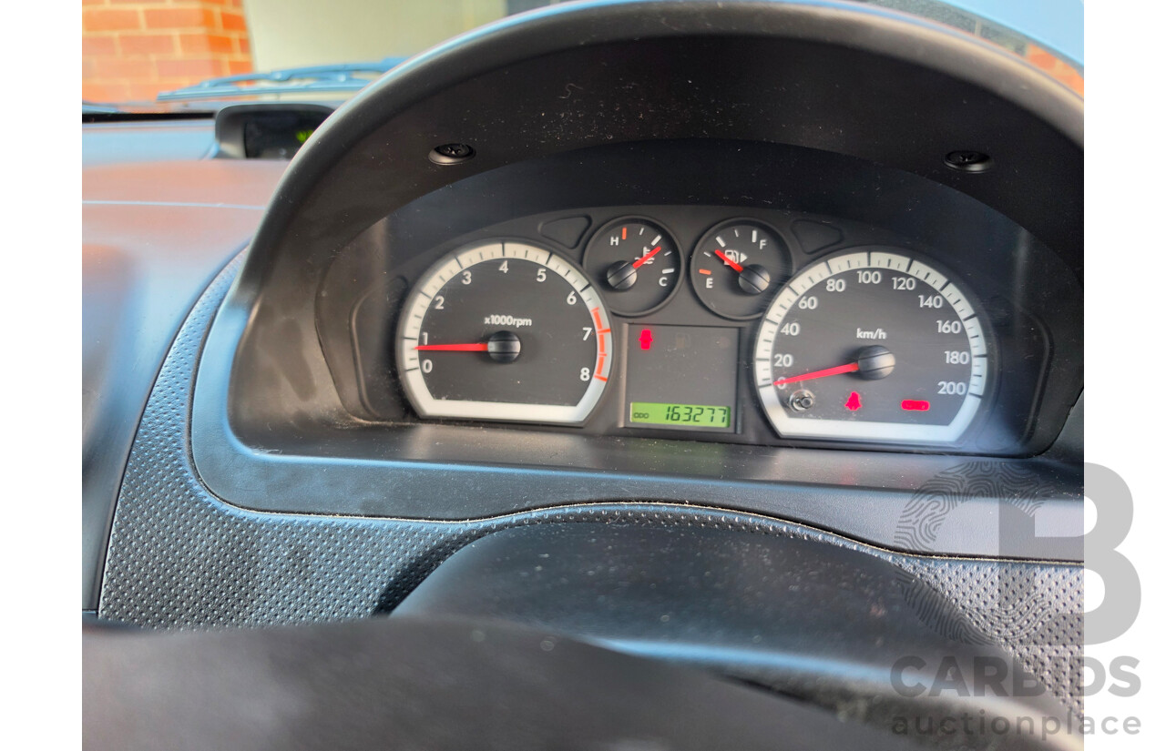 04/2010 Holden Barina  TK MY10 3d Hatchback Silver 1.6L