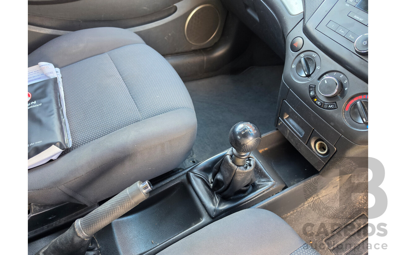 04/2010 Holden Barina  TK MY10 3d Hatchback Silver 1.6L