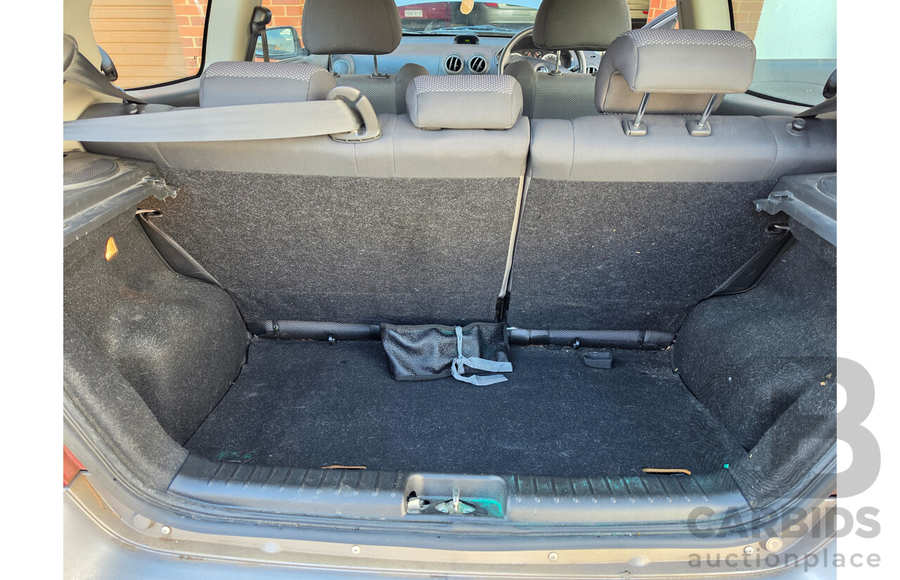 04/2010 Holden Barina  TK MY10 3d Hatchback Silver 1.6L