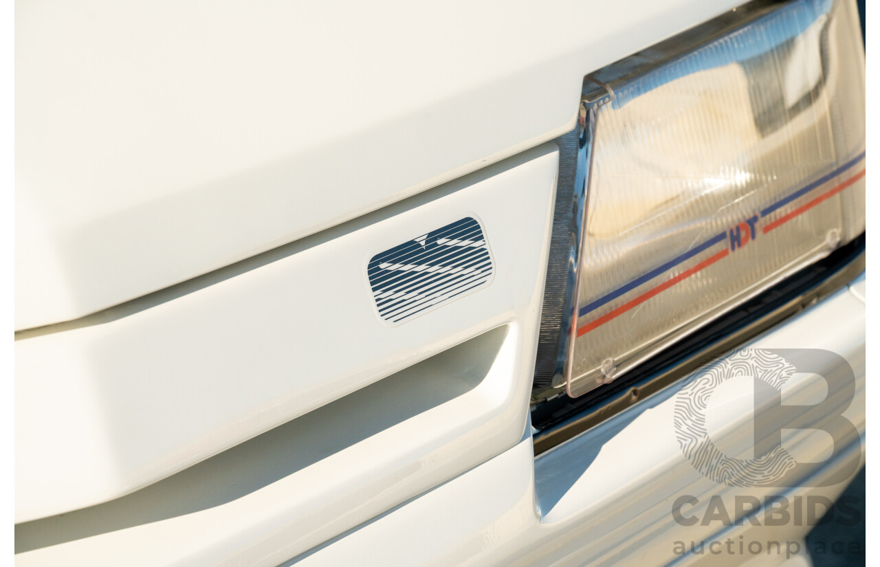 10/1984 Holden VK Commodore SL (134 Package) Group 3 Tribute 4d Sedan Alpine White V8 5.0L - Modified