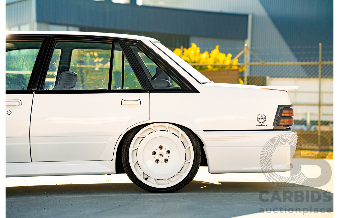 10/1984 Holden VK Commodore SL (134 Package) Group 3 Tribute 4d Sedan Alpine White V8 5.0L - Modified