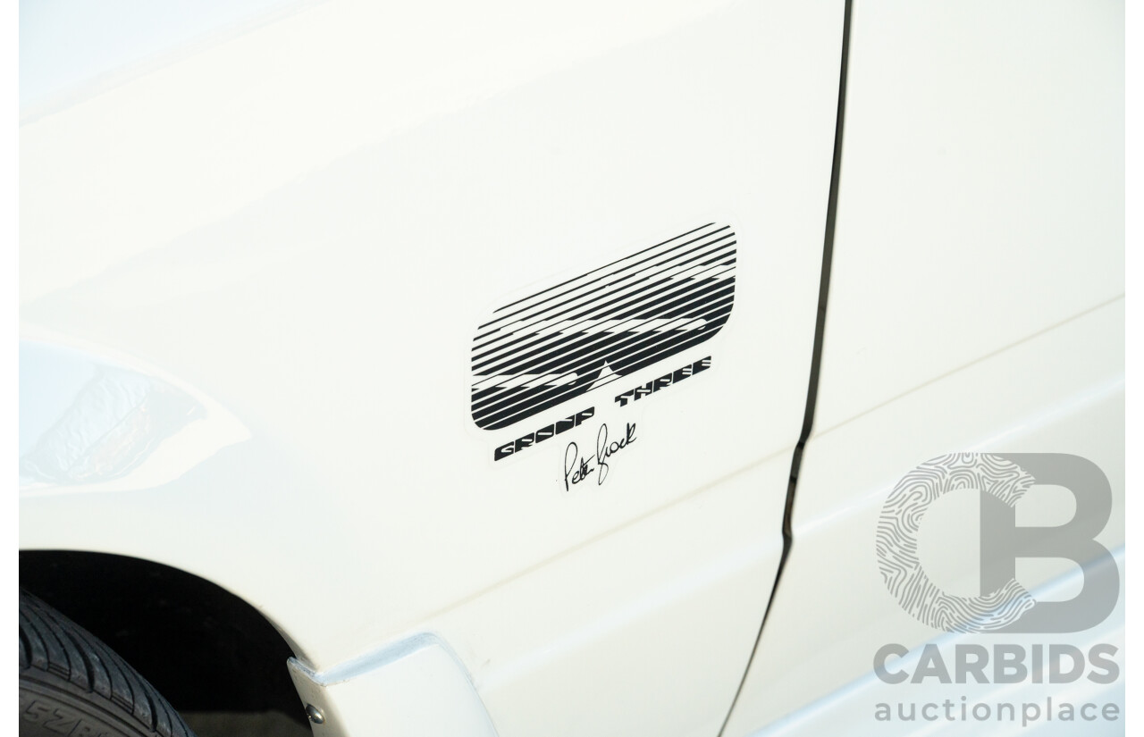 10/1984 Holden VK Commodore SL (134 Package) Group 3 Tribute 4d Sedan Alpine White V8 5.0L - Modified