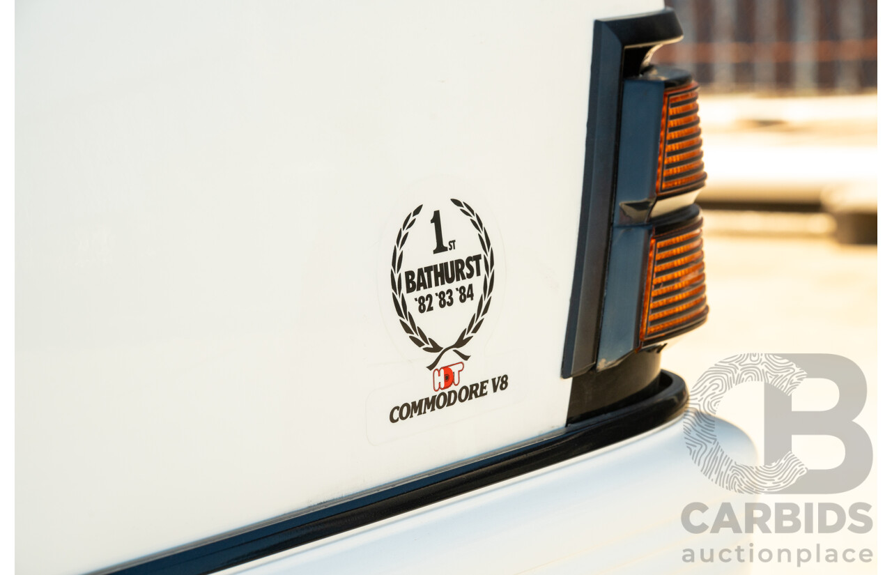 10/1984 Holden VK Commodore SL (134 Package) Group 3 Tribute 4d Sedan Alpine White V8 5.0L - Modified