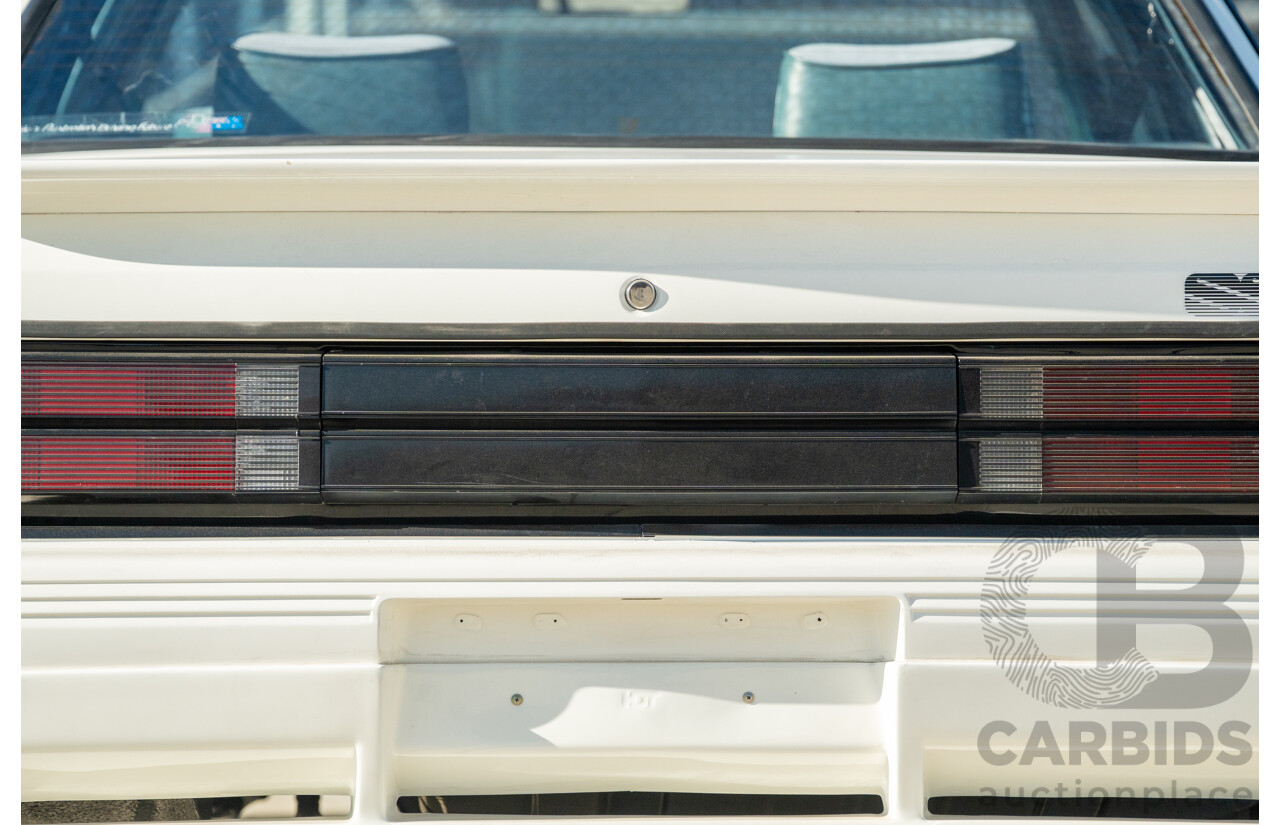 10/1984 Holden VK Commodore SL (134 Package) Group 3 Tribute 4d Sedan Alpine White V8 5.0L - Modified