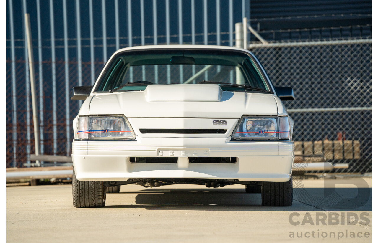 10/1984 Holden VK Commodore SL (134 Package) Group 3 Tribute 4d Sedan Alpine White V8 5.0L - Modified