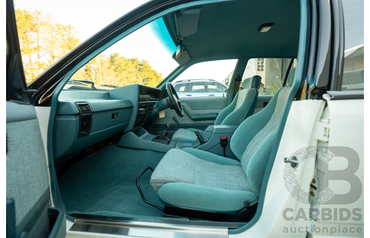 10/1984 Holden VK Commodore SL (134 Package) Group 3 Tribute 4d Sedan Alpine White V8 5.0L - Modified