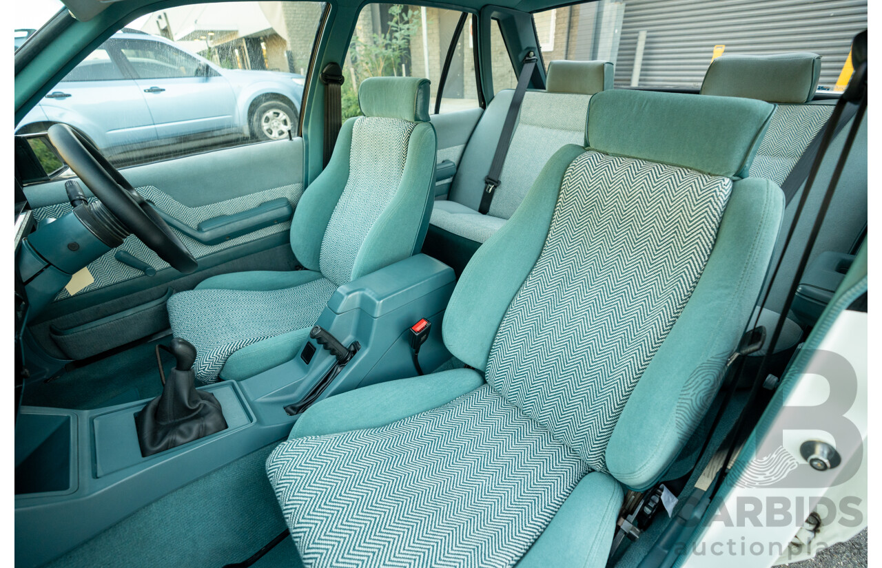 10/1984 Holden VK Commodore SL (134 Package) Group 3 Tribute 4d Sedan Alpine White V8 5.0L - Modified