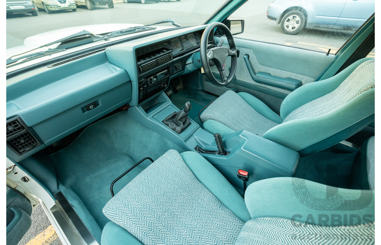 10/1984 Holden VK Commodore SL (134 Package) Group 3 Tribute 4d Sedan Alpine White V8 5.0L - Modified