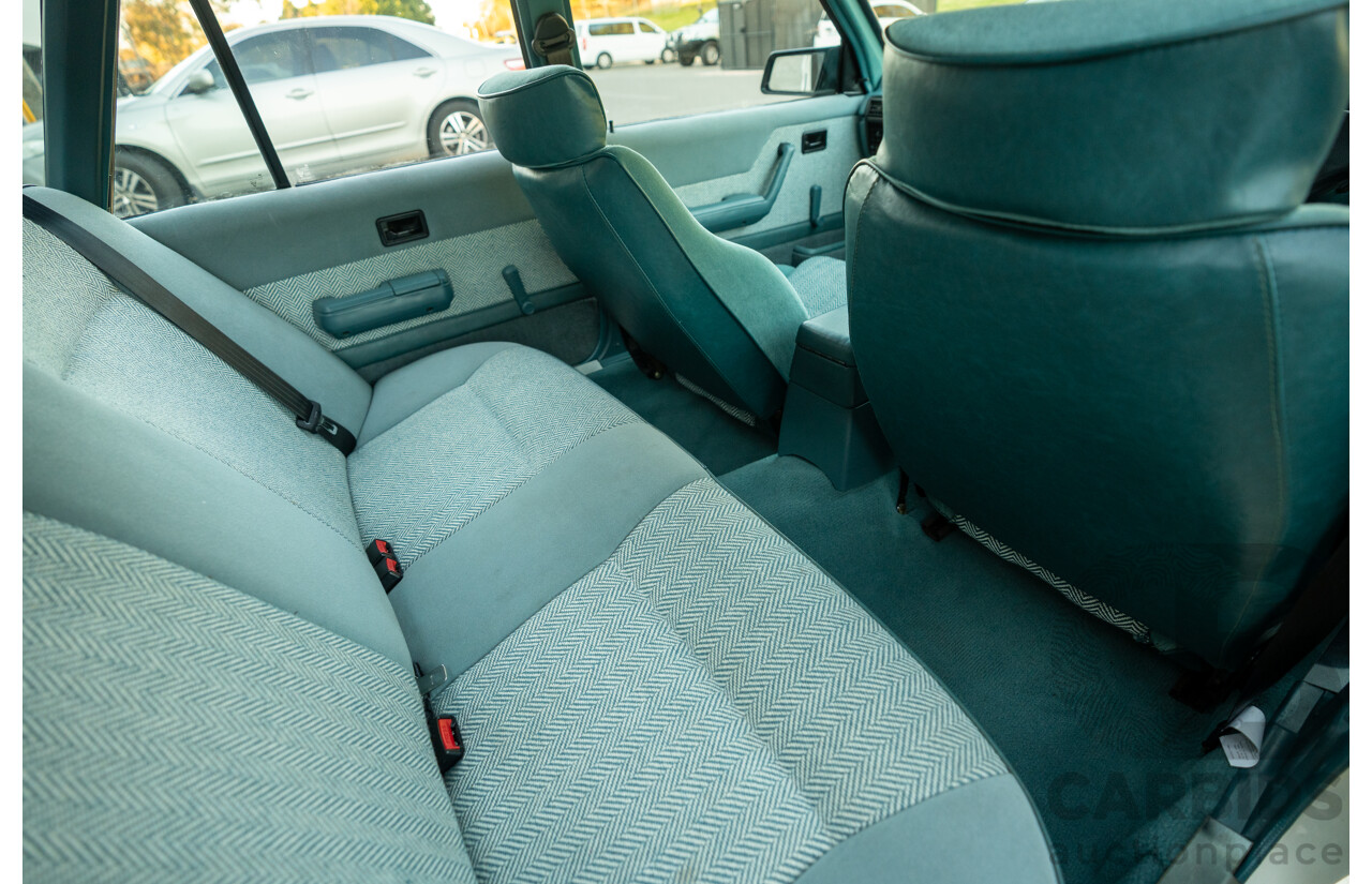10/1984 Holden VK Commodore SL (134 Package) Group 3 Tribute 4d Sedan Alpine White V8 5.0L - Modified