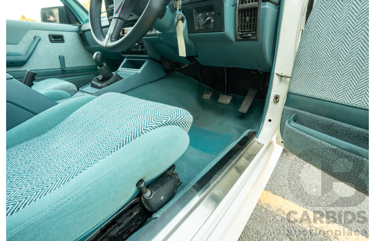 10/1984 Holden VK Commodore SL (134 Package) Group 3 Tribute 4d Sedan Alpine White V8 5.0L - Modified