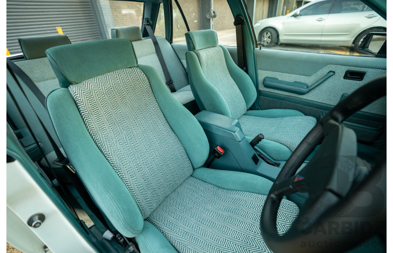 10/1984 Holden VK Commodore SL (134 Package) Group 3 Tribute 4d Sedan Alpine White V8 5.0L - Modified
