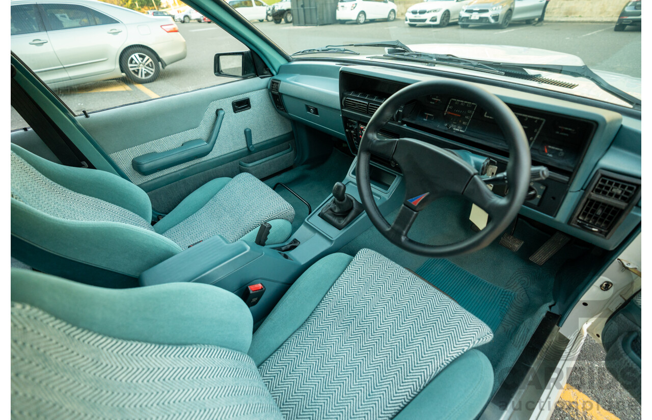 10/1984 Holden VK Commodore SL (134 Package) Group 3 Tribute 4d Sedan Alpine White V8 5.0L - Modified