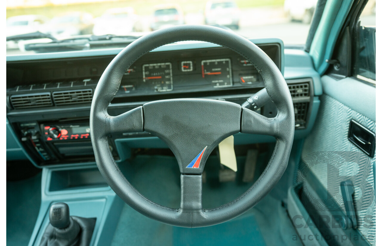 10/1984 Holden VK Commodore SL (134 Package) Group 3 Tribute 4d Sedan Alpine White V8 5.0L - Modified