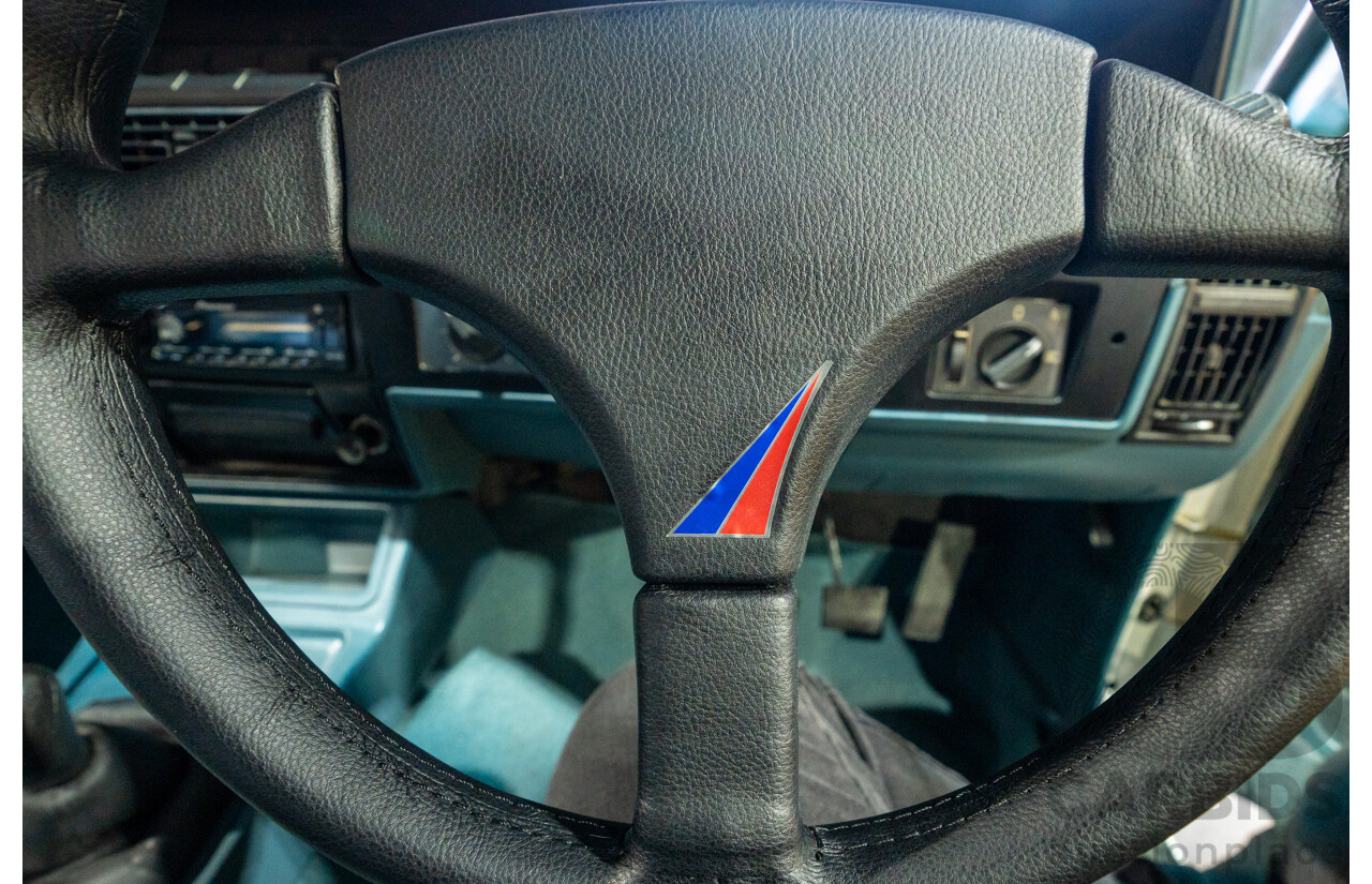 10/1984 Holden VK Commodore SL (134 Package) Group 3 Tribute 4d Sedan Alpine White V8 5.0L - Modified
