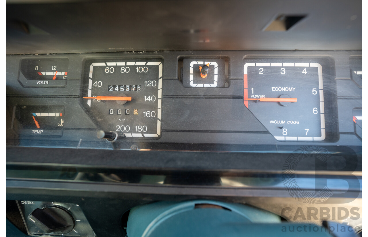 10/1984 Holden VK Commodore SL (134 Package) Group 3 Tribute 4d Sedan Alpine White V8 5.0L - Modified