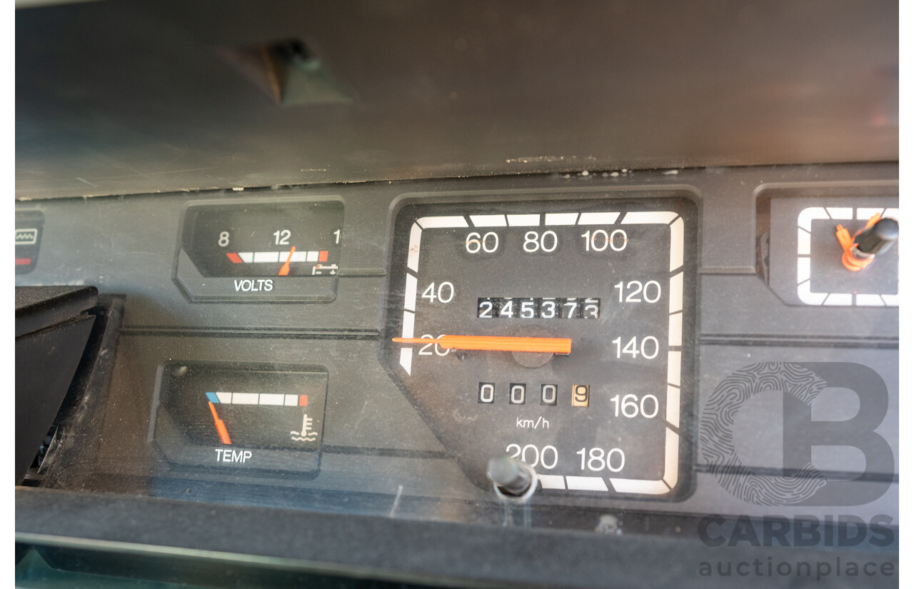 10/1984 Holden VK Commodore SL (134 Package) Group 3 Tribute 4d Sedan Alpine White V8 5.0L - Modified