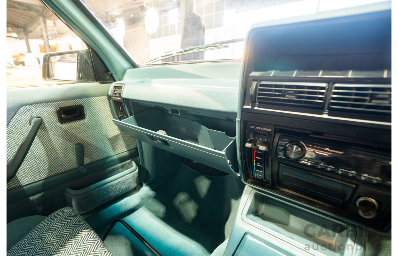 10/1984 Holden VK Commodore SL (134 Package) Group 3 Tribute 4d Sedan Alpine White V8 5.0L - Modified
