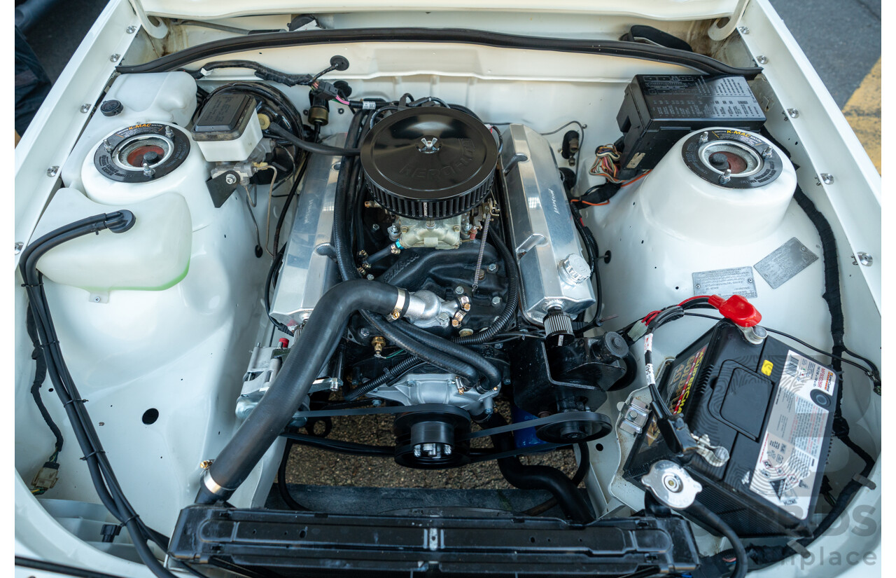 10/1984 Holden VK Commodore SL (134 Package) Group 3 Tribute 4d Sedan Alpine White V8 5.0L - Modified