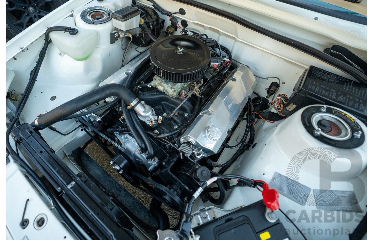10/1984 Holden VK Commodore SL (134 Package) Group 3 Tribute 4d Sedan Alpine White V8 5.0L - Modified