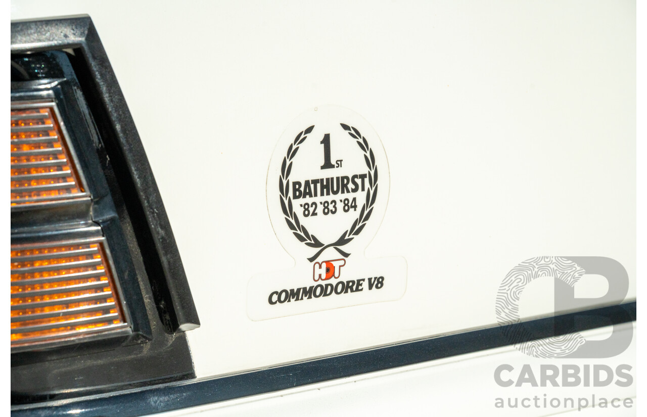 10/1984 Holden VK Commodore SL (134 Package) Group 3 Tribute 4d Sedan Alpine White V8 5.0L - Modified