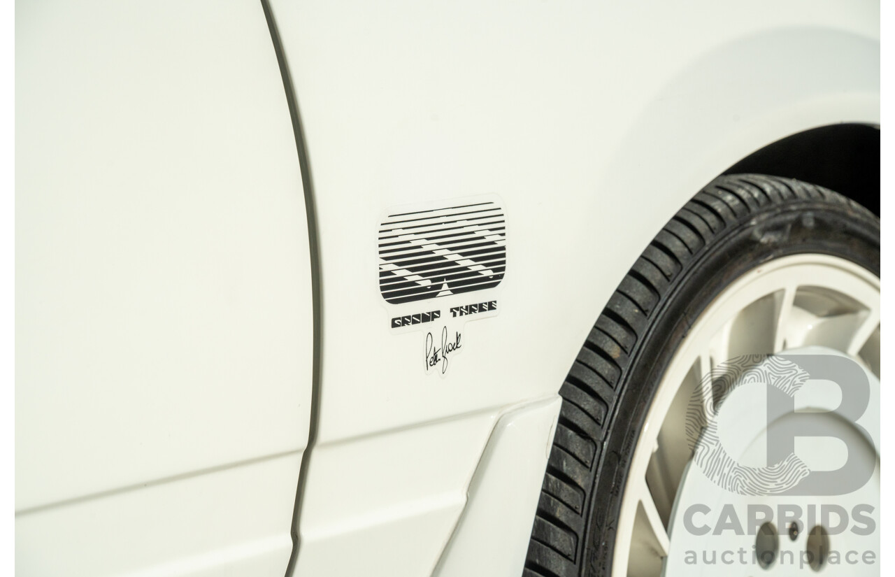 10/1984 Holden VK Commodore SL (134 Package) Group 3 Tribute 4d Sedan Alpine White V8 5.0L - Modified