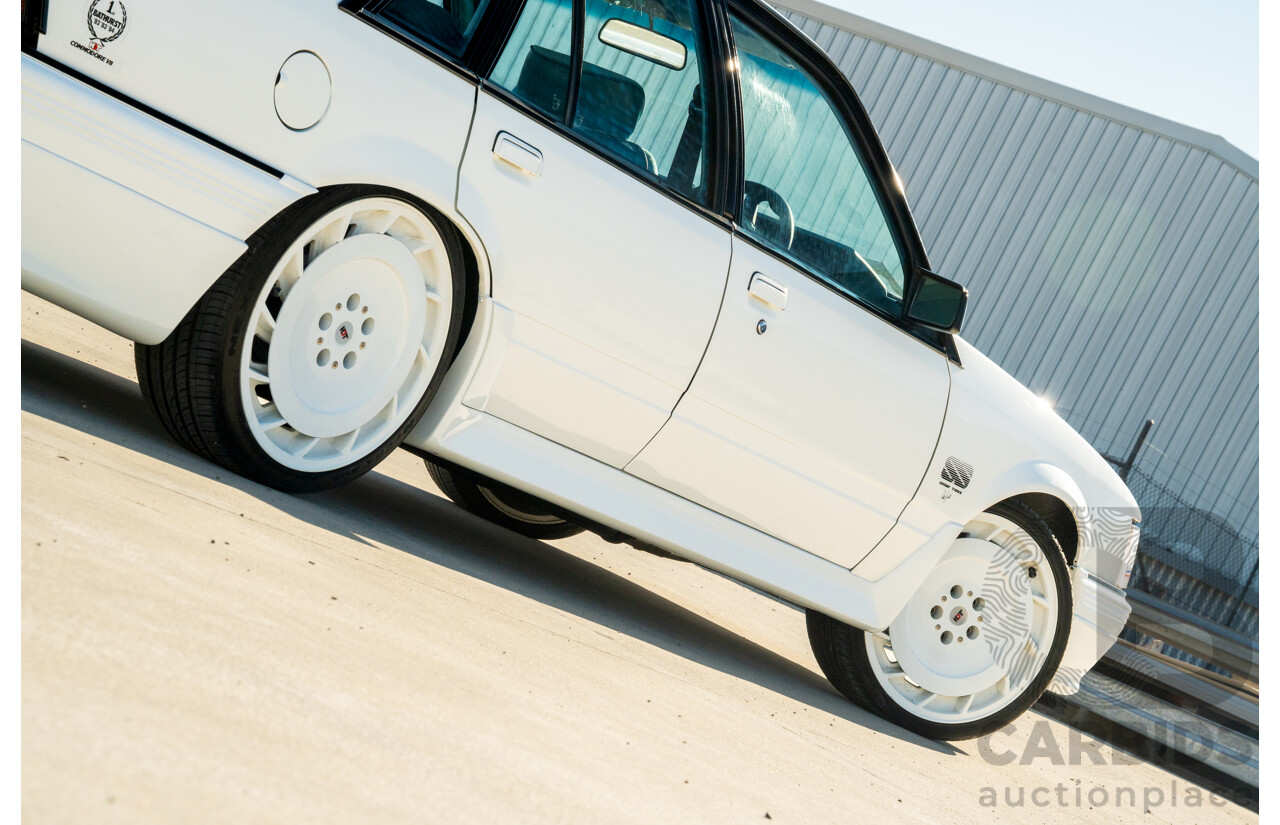 10/1984 Holden VK Commodore SL (134 Package) Group 3 Tribute 4d Sedan Alpine White V8 5.0L - Modified