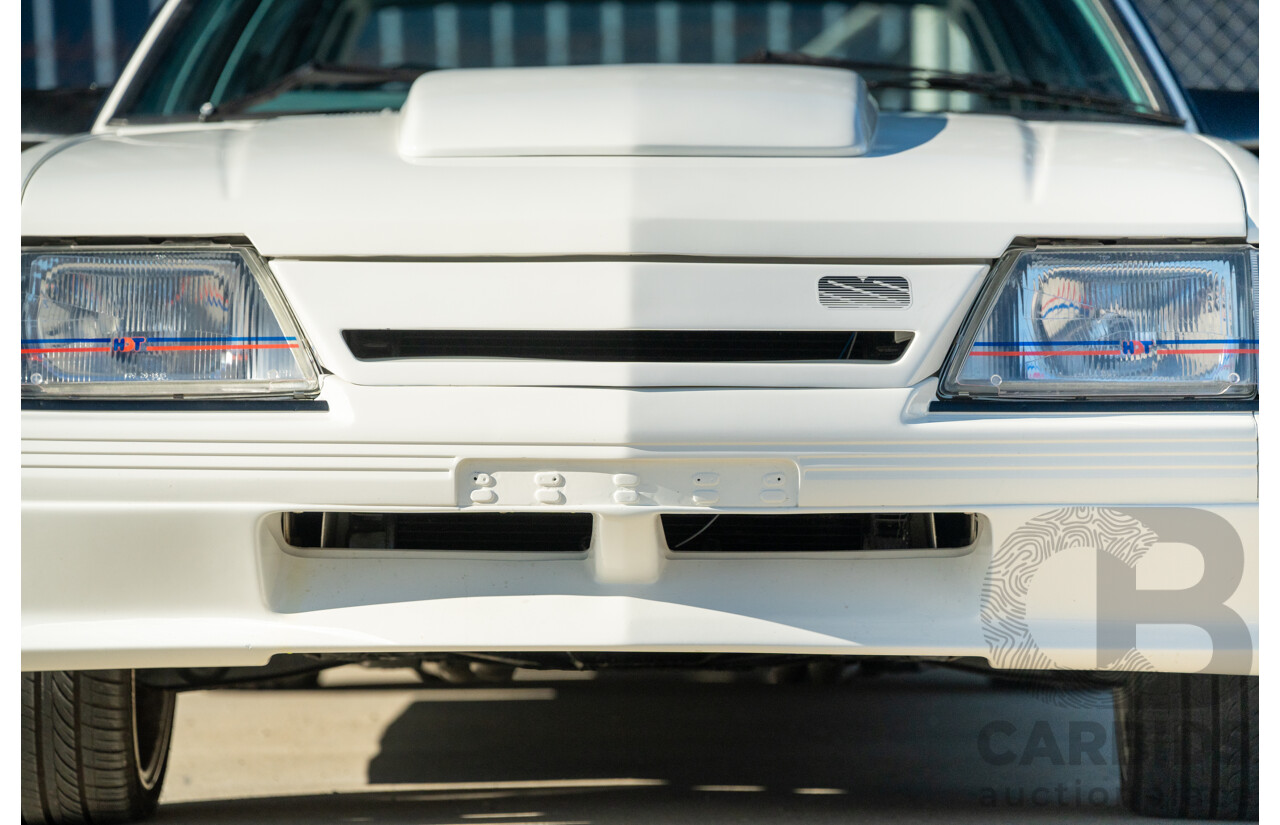 10/1984 Holden VK Commodore SL (134 Package) Group 3 Tribute 4d Sedan Alpine White V8 5.0L - Modified