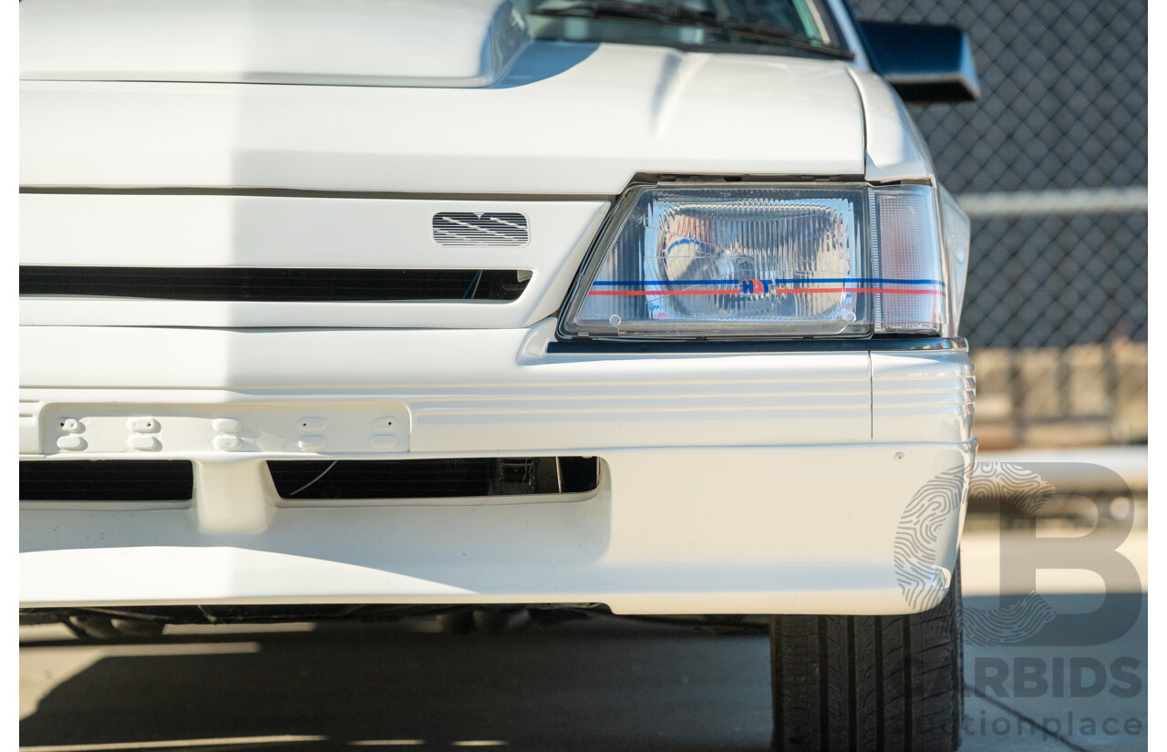 10/1984 Holden VK Commodore SL (134 Package) Group 3 Tribute 4d Sedan Alpine White V8 5.0L - Modified