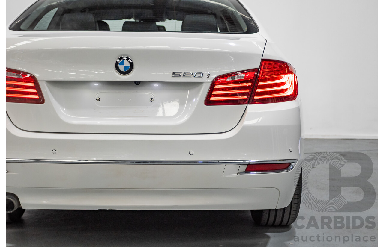 9/2014 BMW 520i Luxury Line F10 MY14 4d Sedan Alpin White Turbo 2.0L