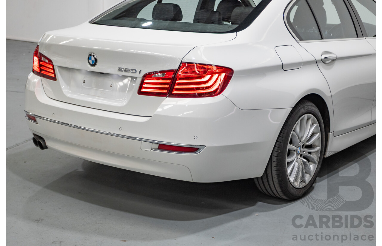 9/2014 BMW 520i Luxury Line F10 MY14 4d Sedan Alpin White Turbo 2.0L