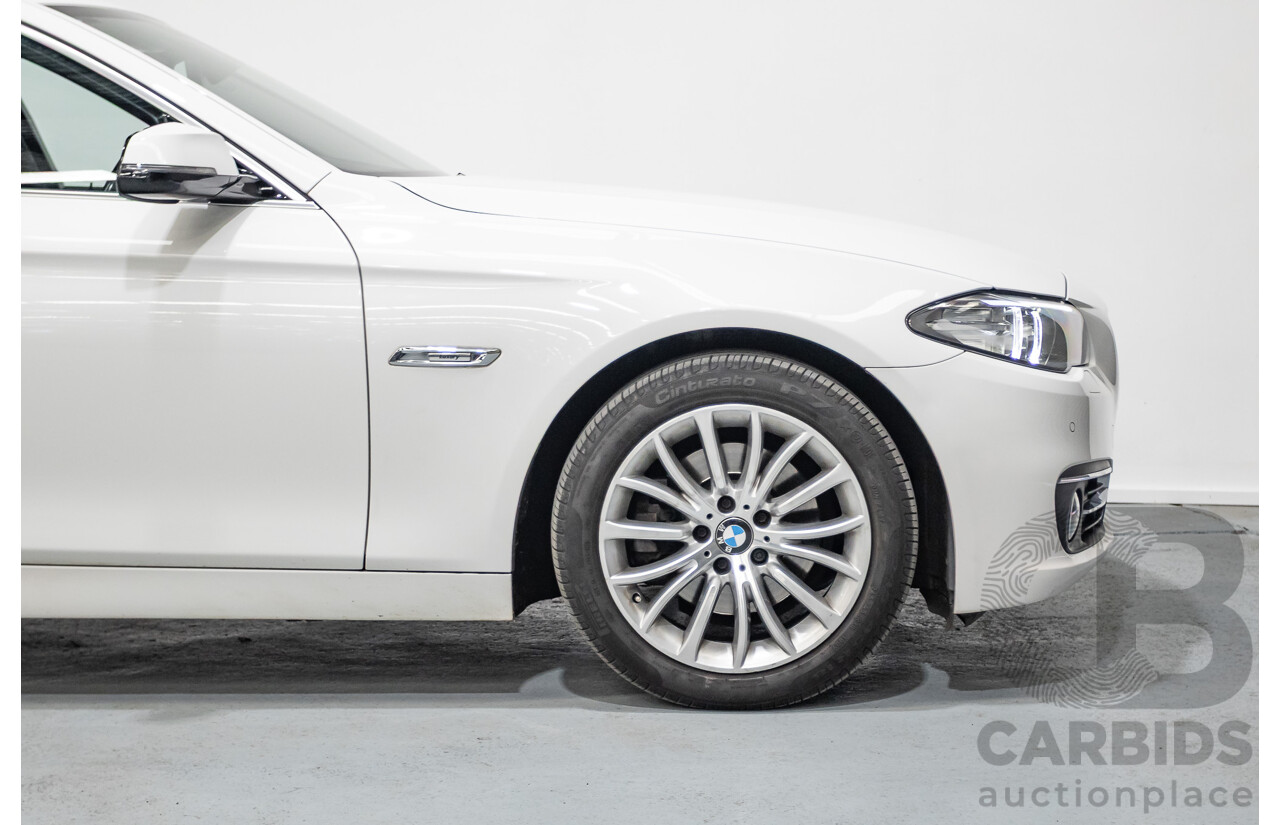 9/2014 BMW 520i Luxury Line F10 MY14 4d Sedan Alpin White Turbo 2.0L