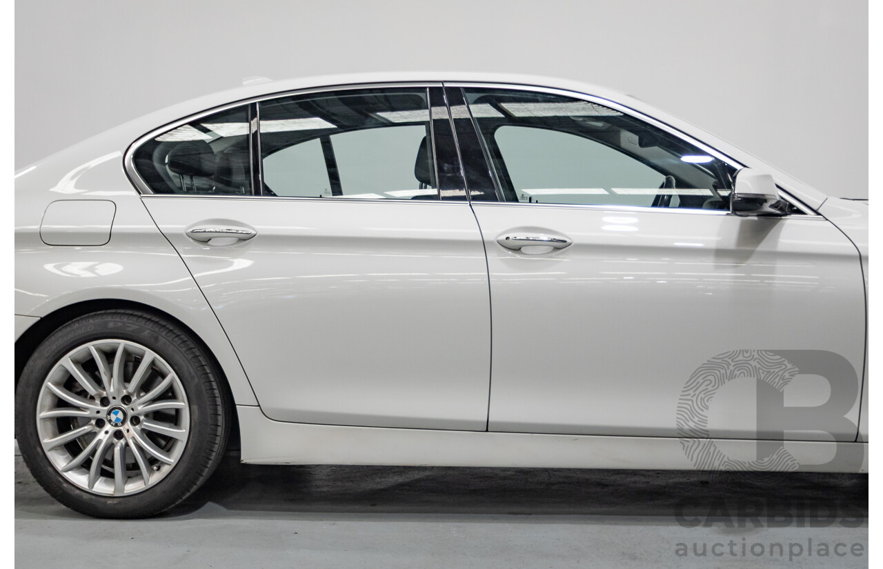 9/2014 BMW 520i Luxury Line F10 MY14 4d Sedan Alpin White Turbo 2.0L