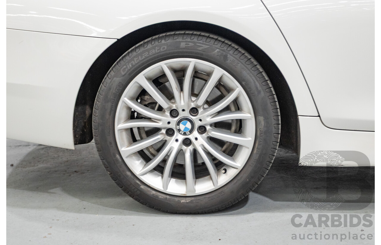 9/2014 BMW 520i Luxury Line F10 MY14 4d Sedan Alpin White Turbo 2.0L
