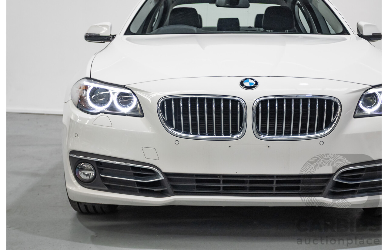 9/2014 BMW 520i Luxury Line F10 MY14 4d Sedan Alpin White Turbo 2.0L