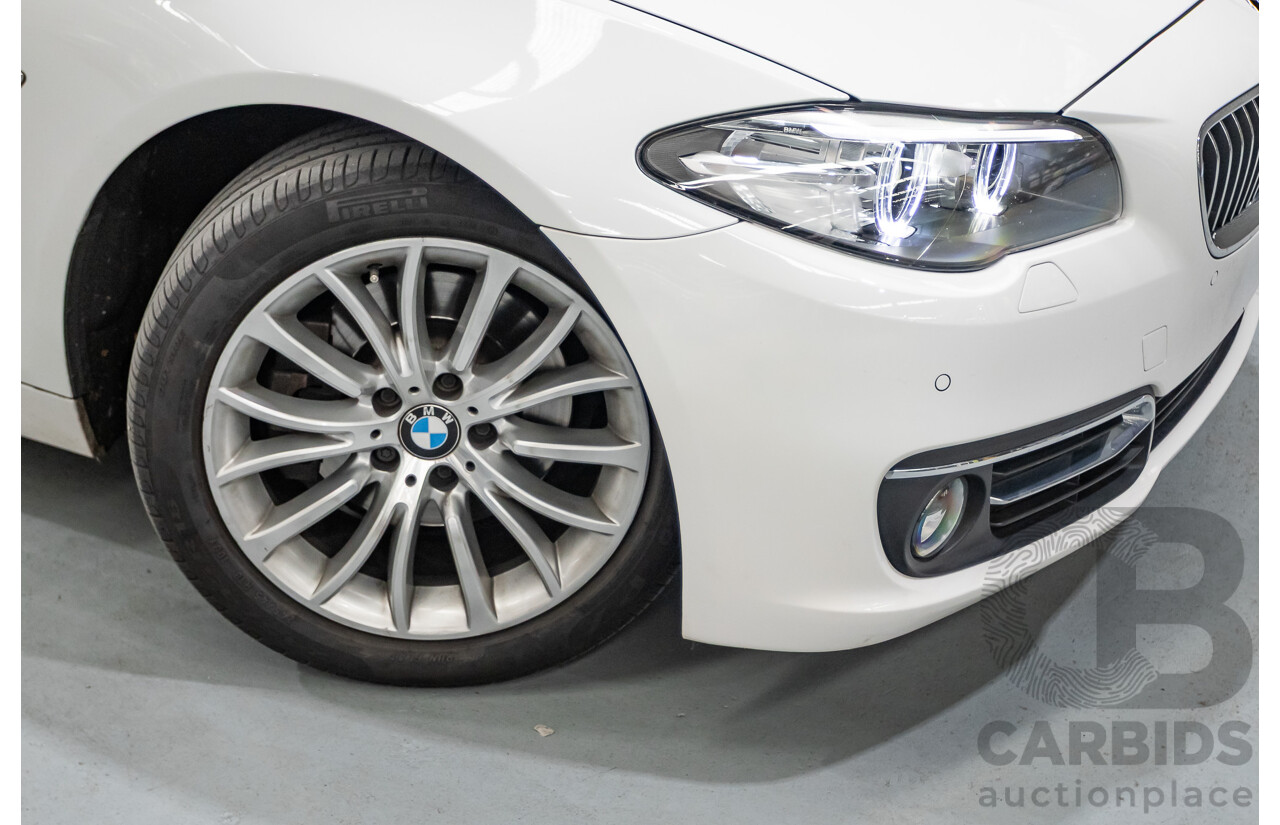 9/2014 BMW 520i Luxury Line F10 MY14 4d Sedan Alpin White Turbo 2.0L