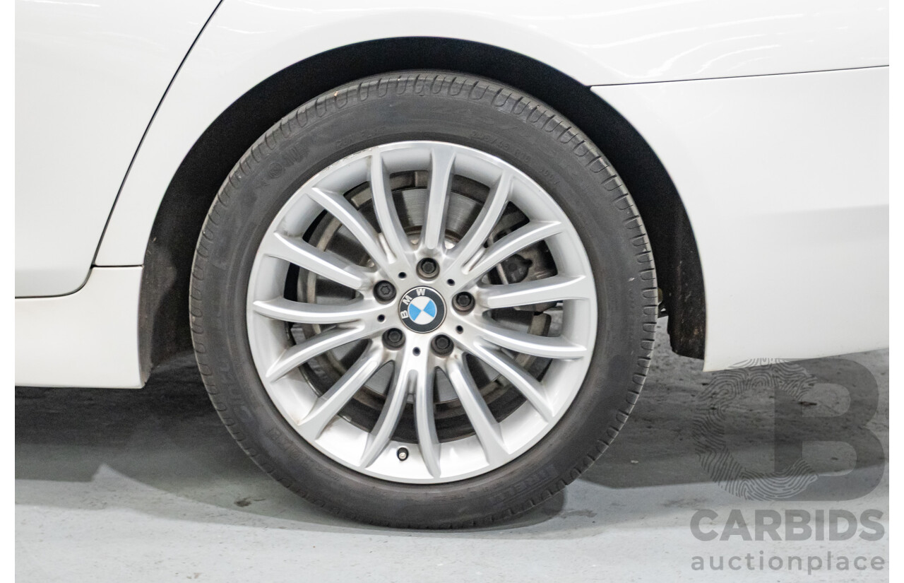 9/2014 BMW 520i Luxury Line F10 MY14 4d Sedan Alpin White Turbo 2.0L