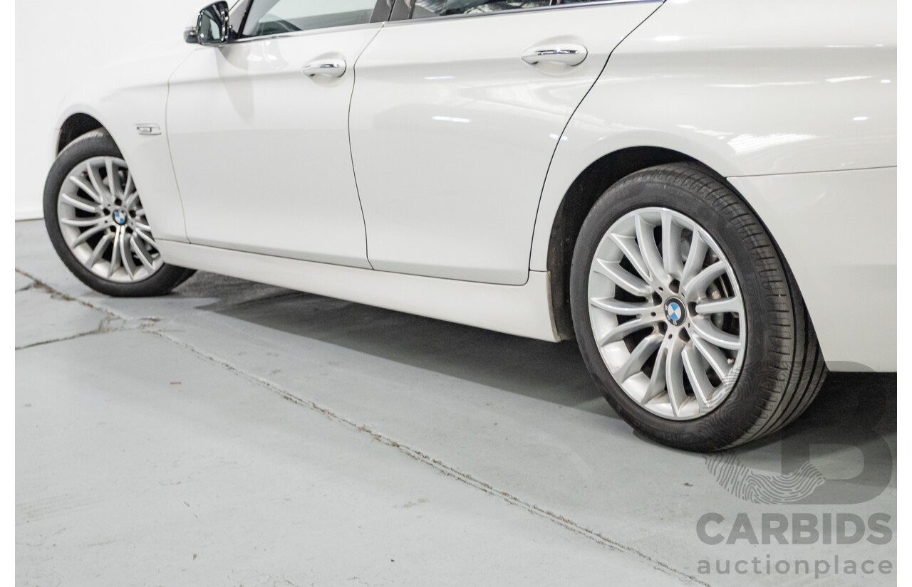9/2014 BMW 520i Luxury Line F10 MY14 4d Sedan Alpin White Turbo 2.0L