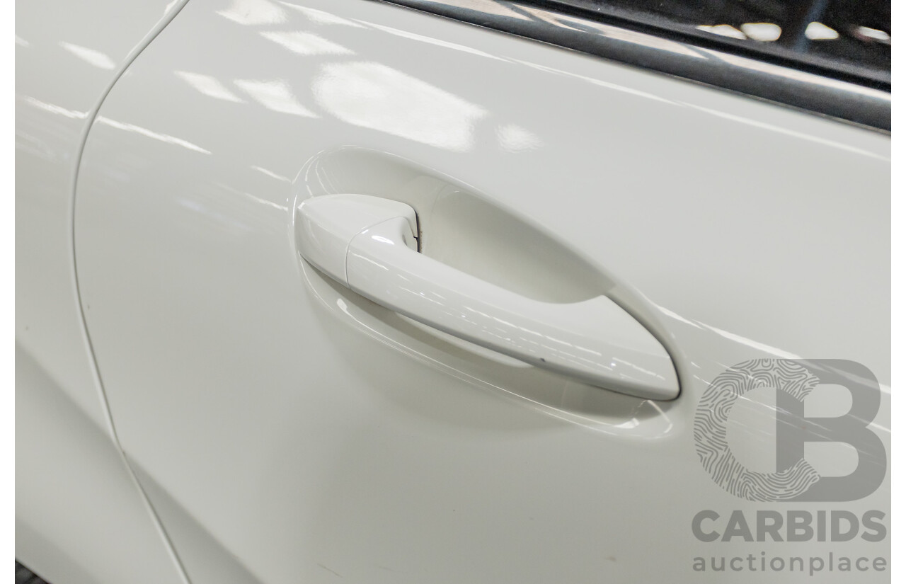 9/2015 Mercedes-Benz B200 246 MY15 5d Hatchback Calcite White Turbo 1.6L