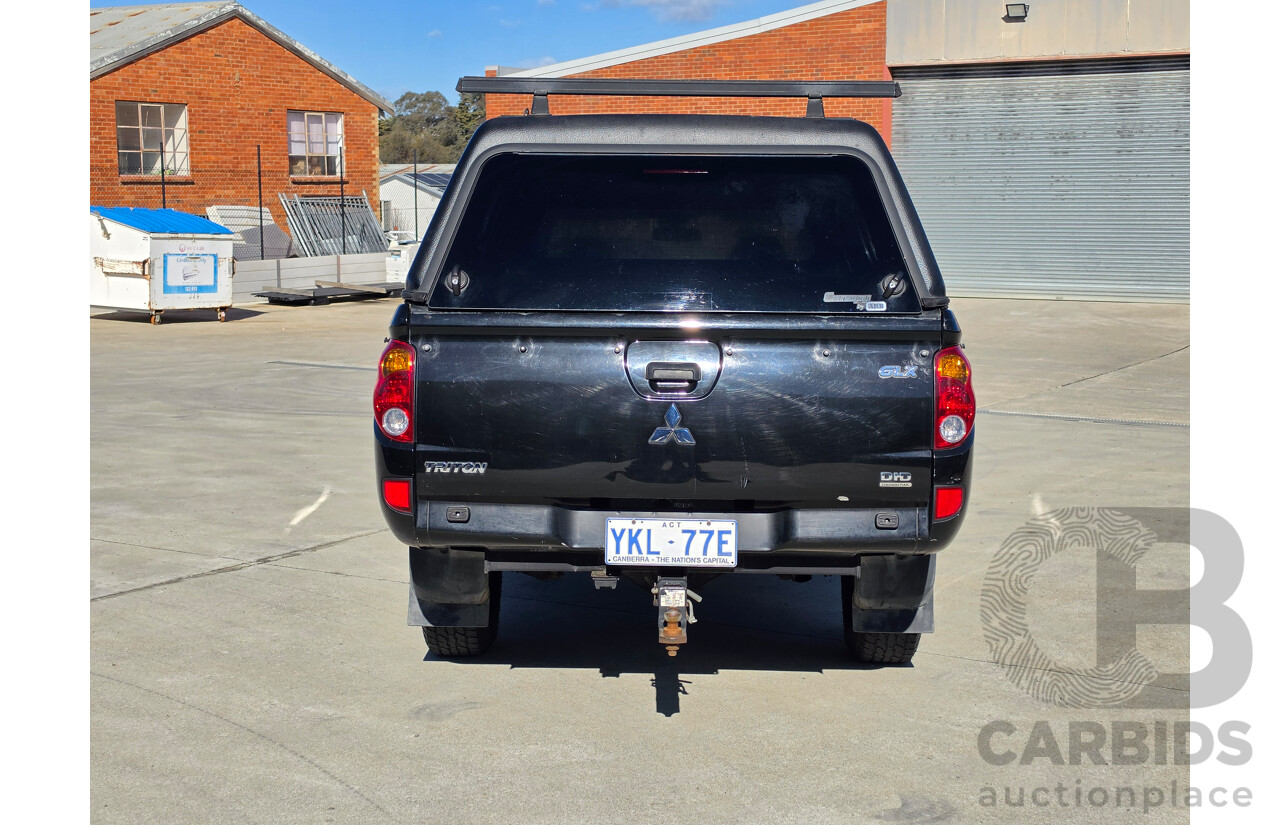 06/2010 Mitsubishi Triton GLX MN MY10 Double Cab Utility Black Turbo Diesel 2.5L