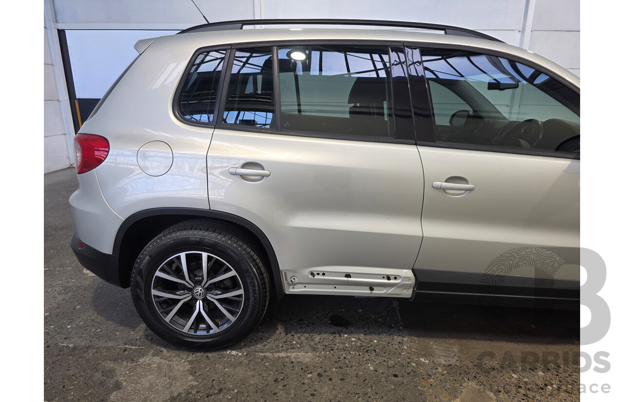 04/2010 Volkswagen Tiguan 125 TSI (4x4) 5NC MY10 4d Wagon Silver 2.0L