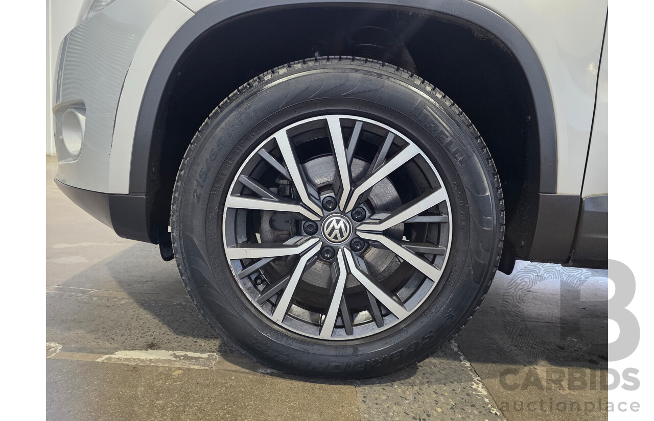 04/2010 Volkswagen Tiguan 125 TSI (4x4) 5NC MY10 4d Wagon Silver 2.0L