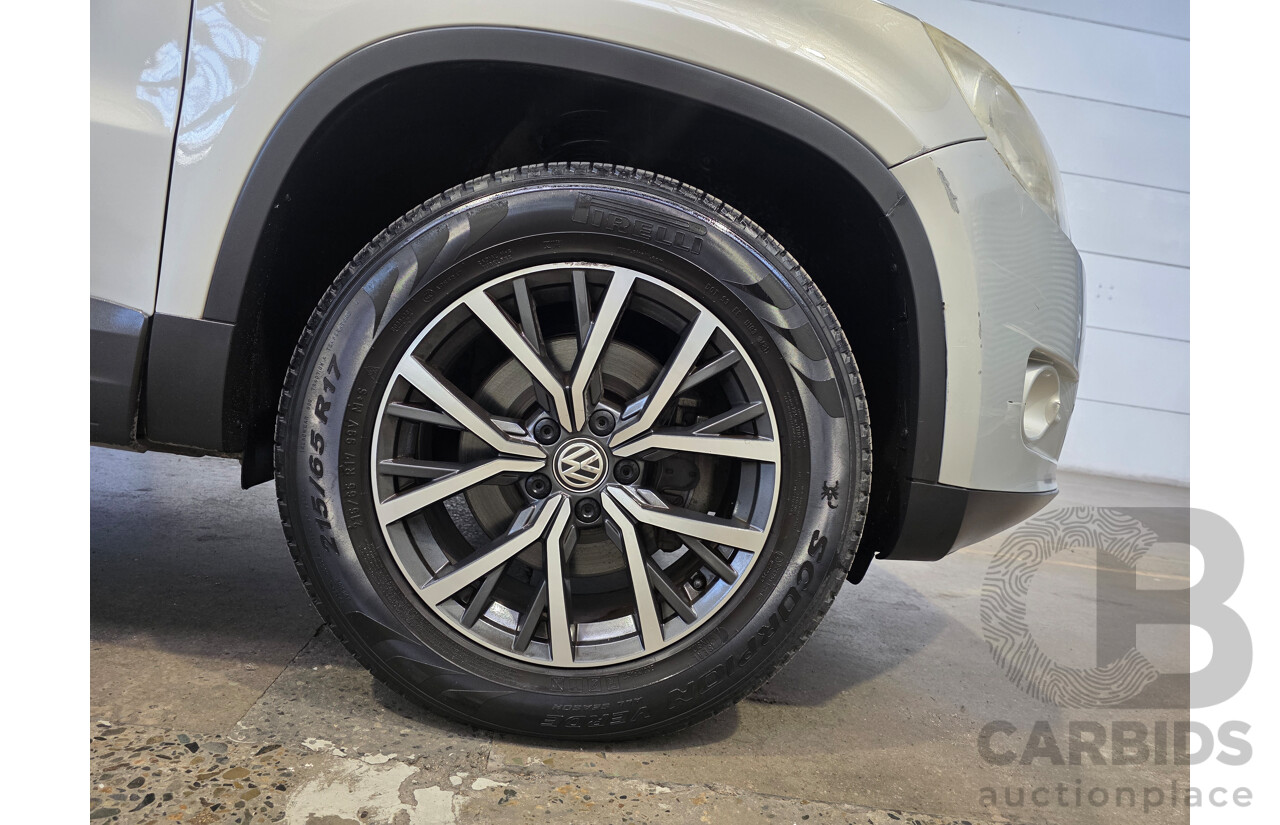 04/2010 Volkswagen Tiguan 125 TSI (4x4) 5NC MY10 4d Wagon Silver 2.0L