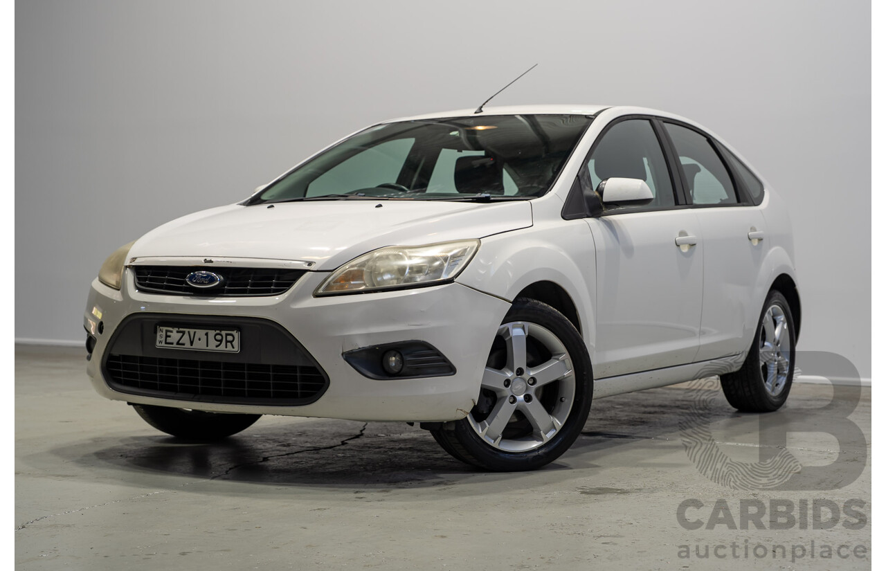 03/2010 Ford Focus LX FWD LV 5d Hatchback White 2.0L