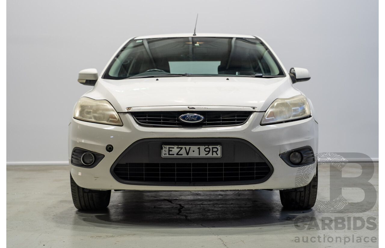 03/2010 Ford Focus LX FWD LV 5d Hatchback White 2.0L