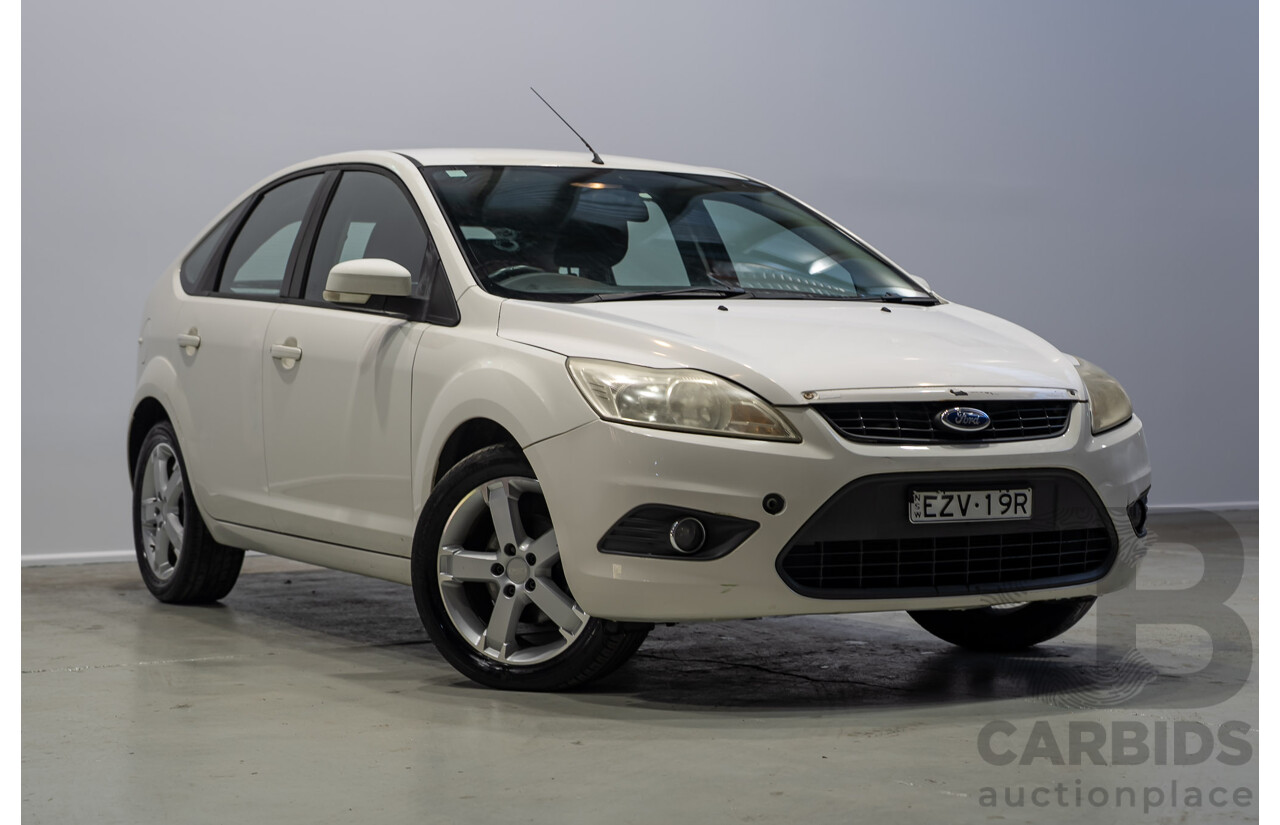 03/2010 Ford Focus LX FWD LV 5d Hatchback White 2.0L
