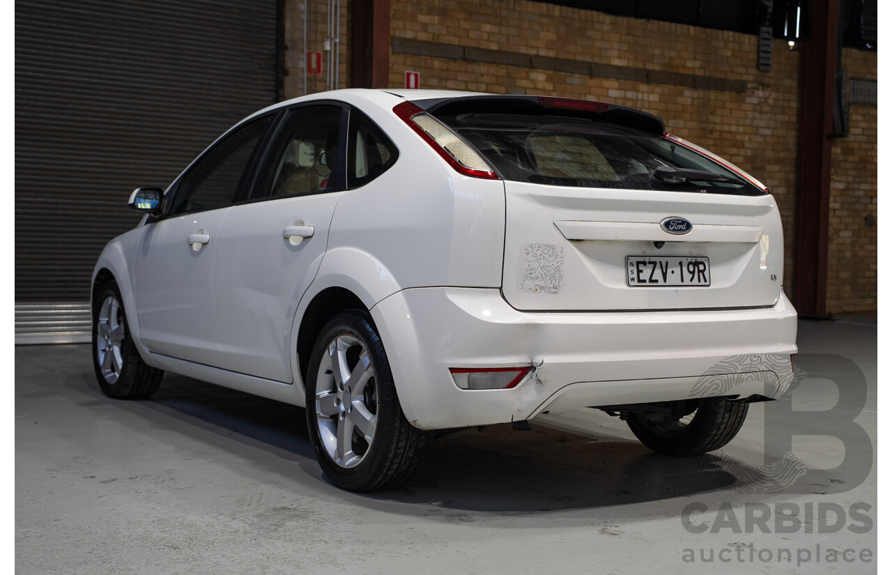 03/2010 Ford Focus LX FWD LV 5d Hatchback White 2.0L